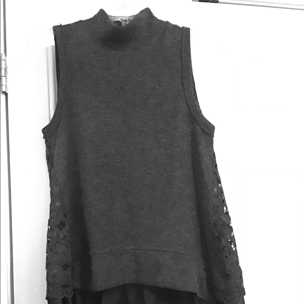 Sleeveless mock neck sweater